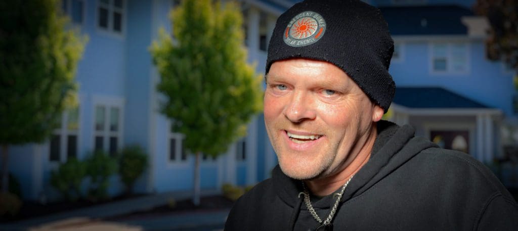 Resident Asa, in front of the Mission