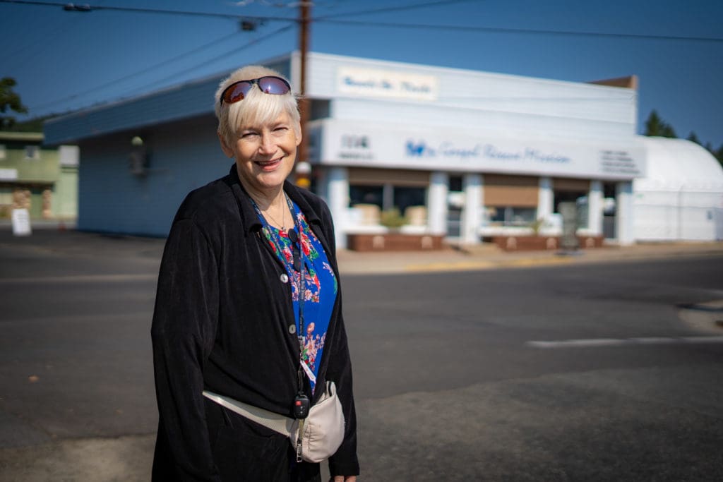 Resident Annie in front of the Booth Street Thrift Store