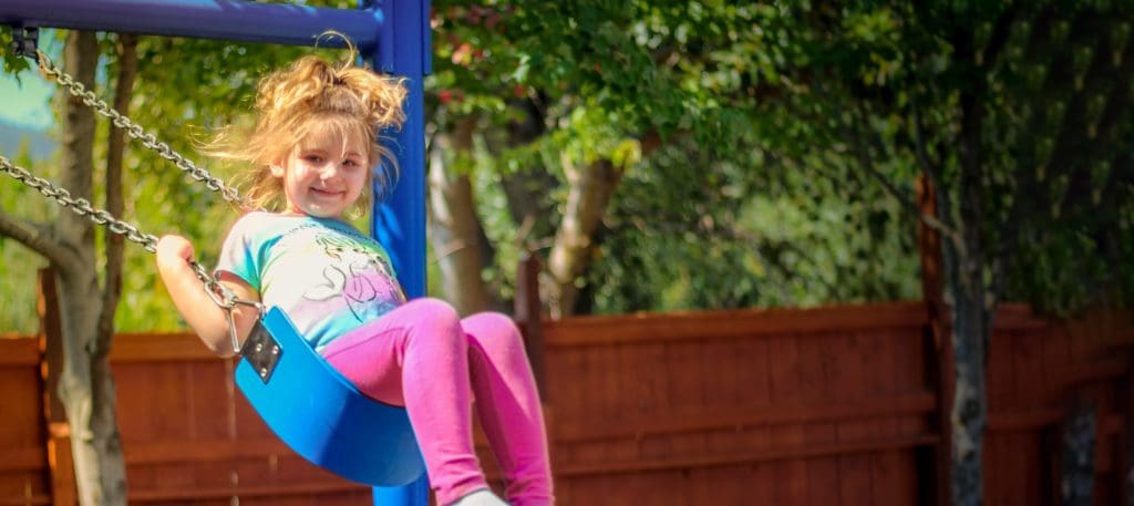 Child on Swing at Fikso Family Center