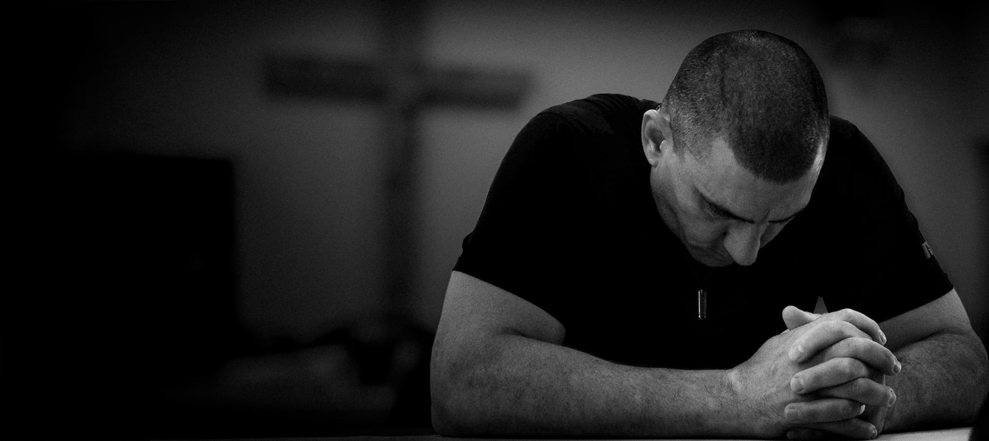 Resident Praying In Chapel