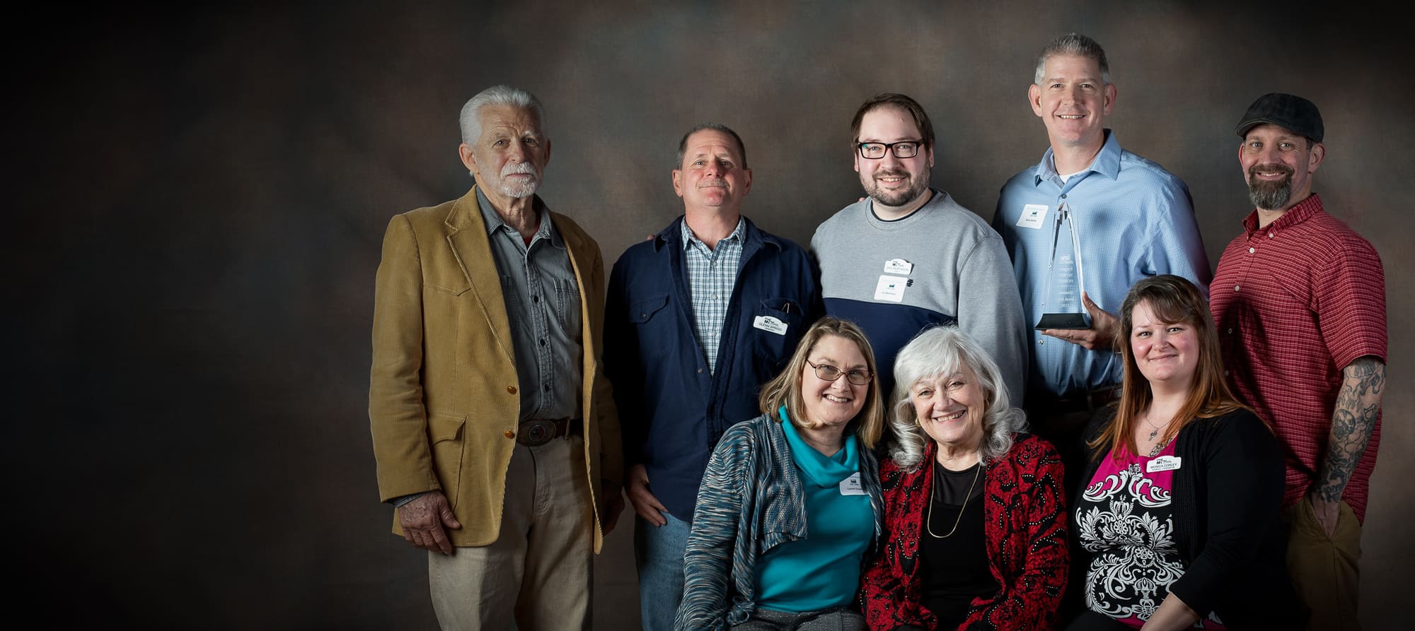Members of GRM staff pose after receiving the Community Spirit Award from the Chamber of Commerce.
