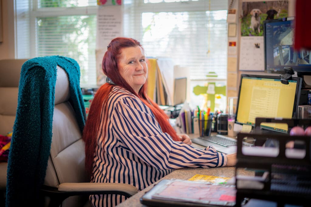 Tara sits at the RA Desk